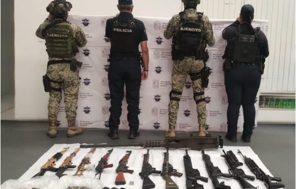 Fuerzas estatales y federales aseguran ametralladora y 11 fusiles en Huetamo: SSP